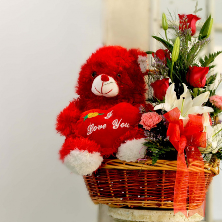 Teddy bear and flowers