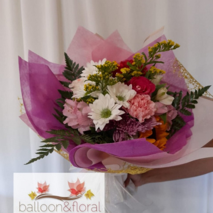 Hand tied bouquet with mixed floral